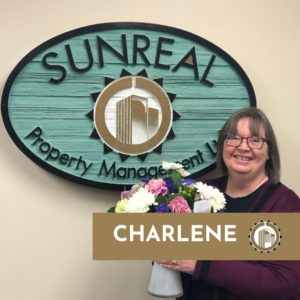 woman holding flowers receptionist sunreal property management ltd 